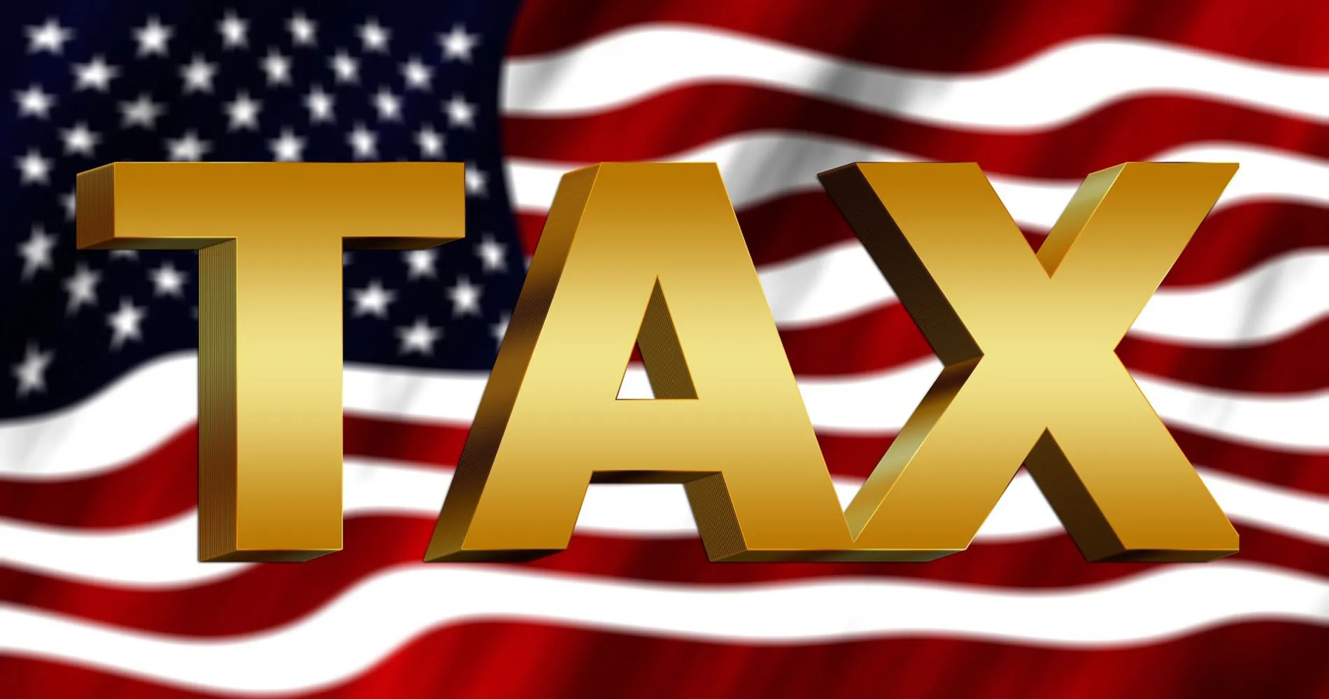 The word TAX in front of the American flag