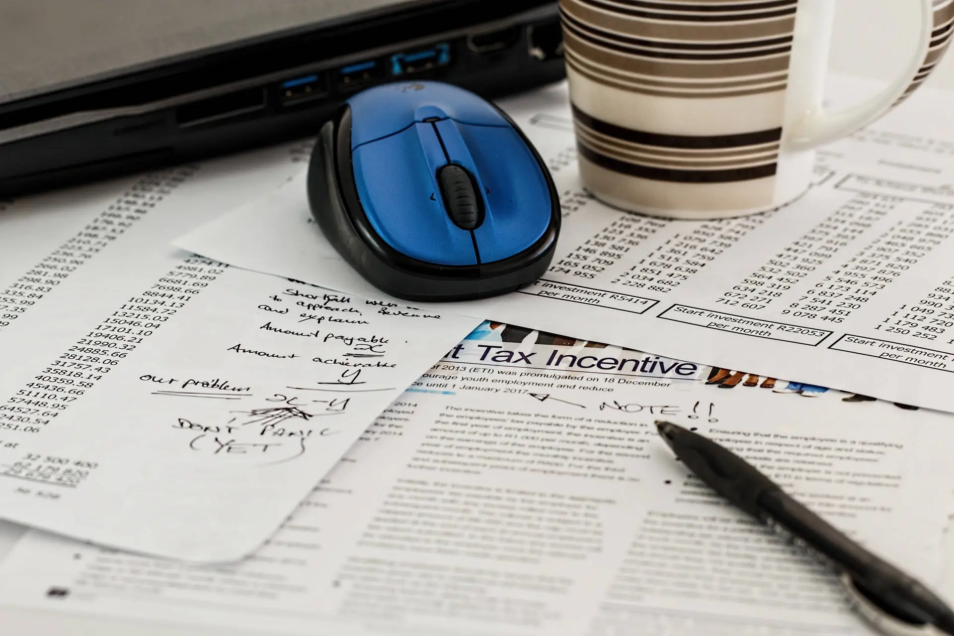 Business records in folders with an office stamp